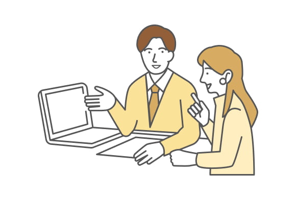 パソコンを見ながら話しているイラスト